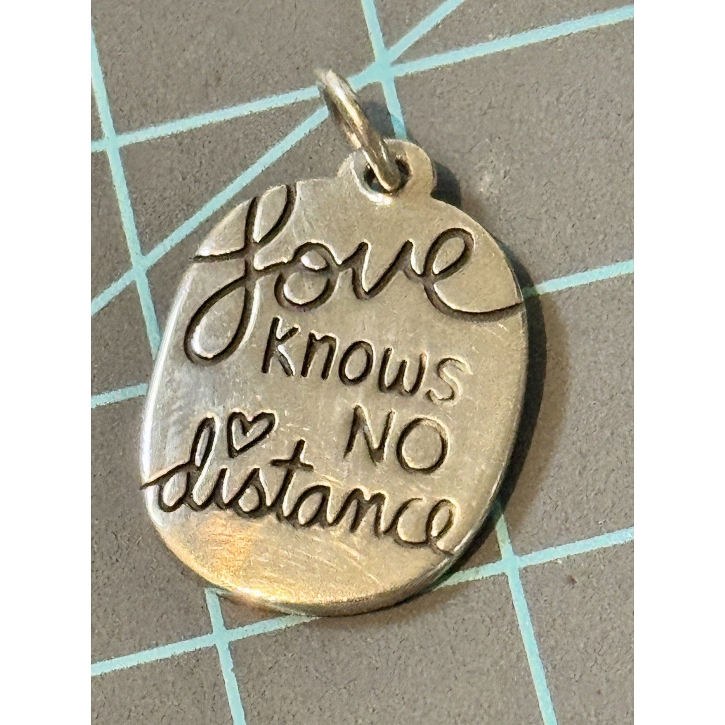 James Avery Retired Love knows no distance Sterling Silver