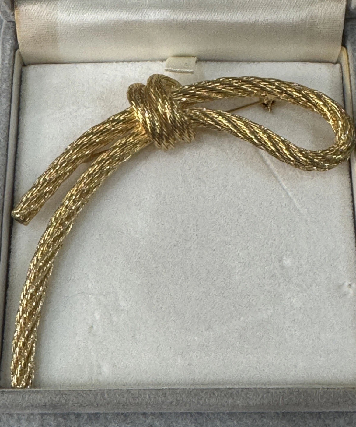 Preowned Vintage New in Box Signed Christian Dior Gold Tone Textured Rope Knot Brooch Pin