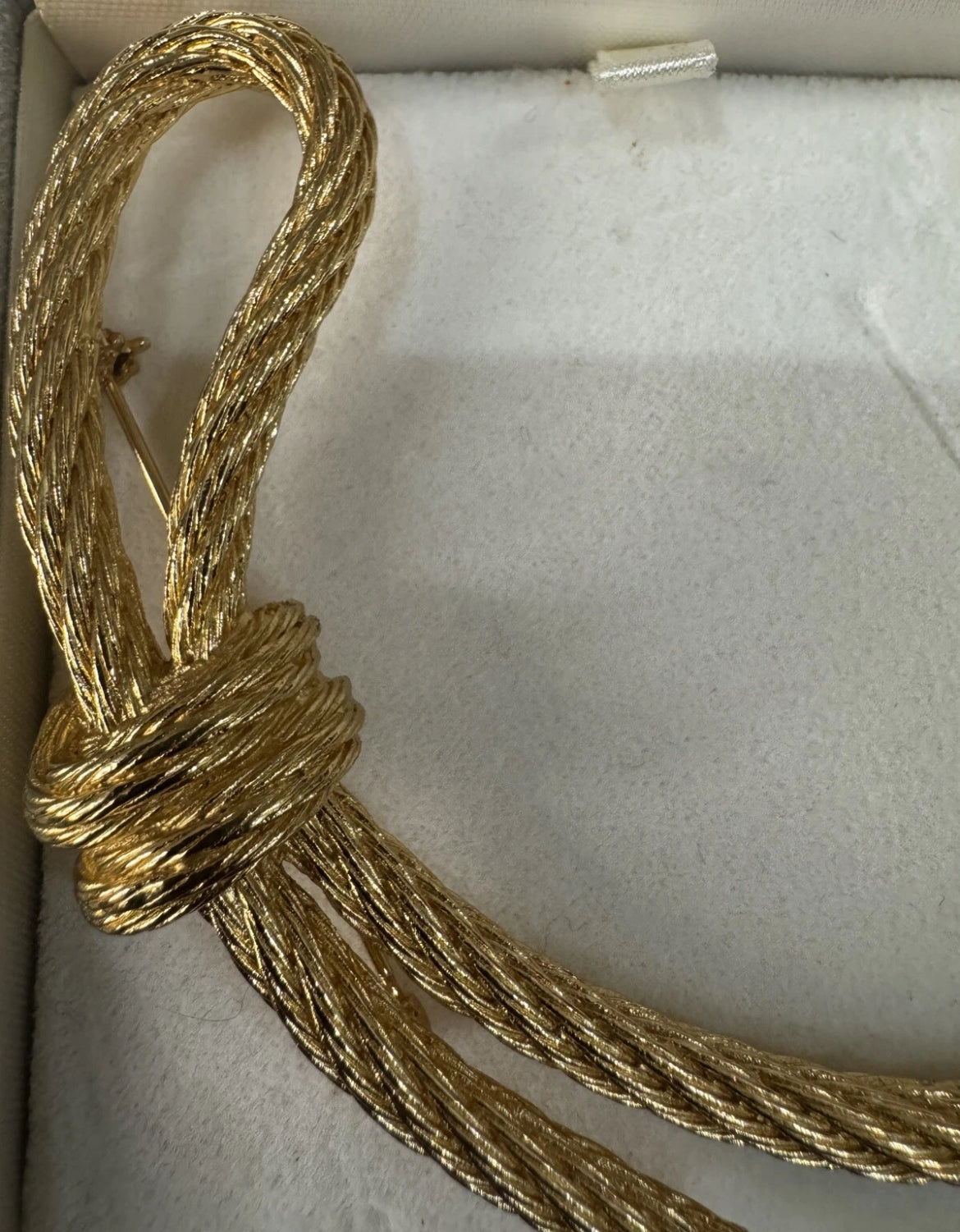 Preowned Vintage New in Box Signed Christian Dior Gold Tone Textured Rope Knot Brooch Pin
