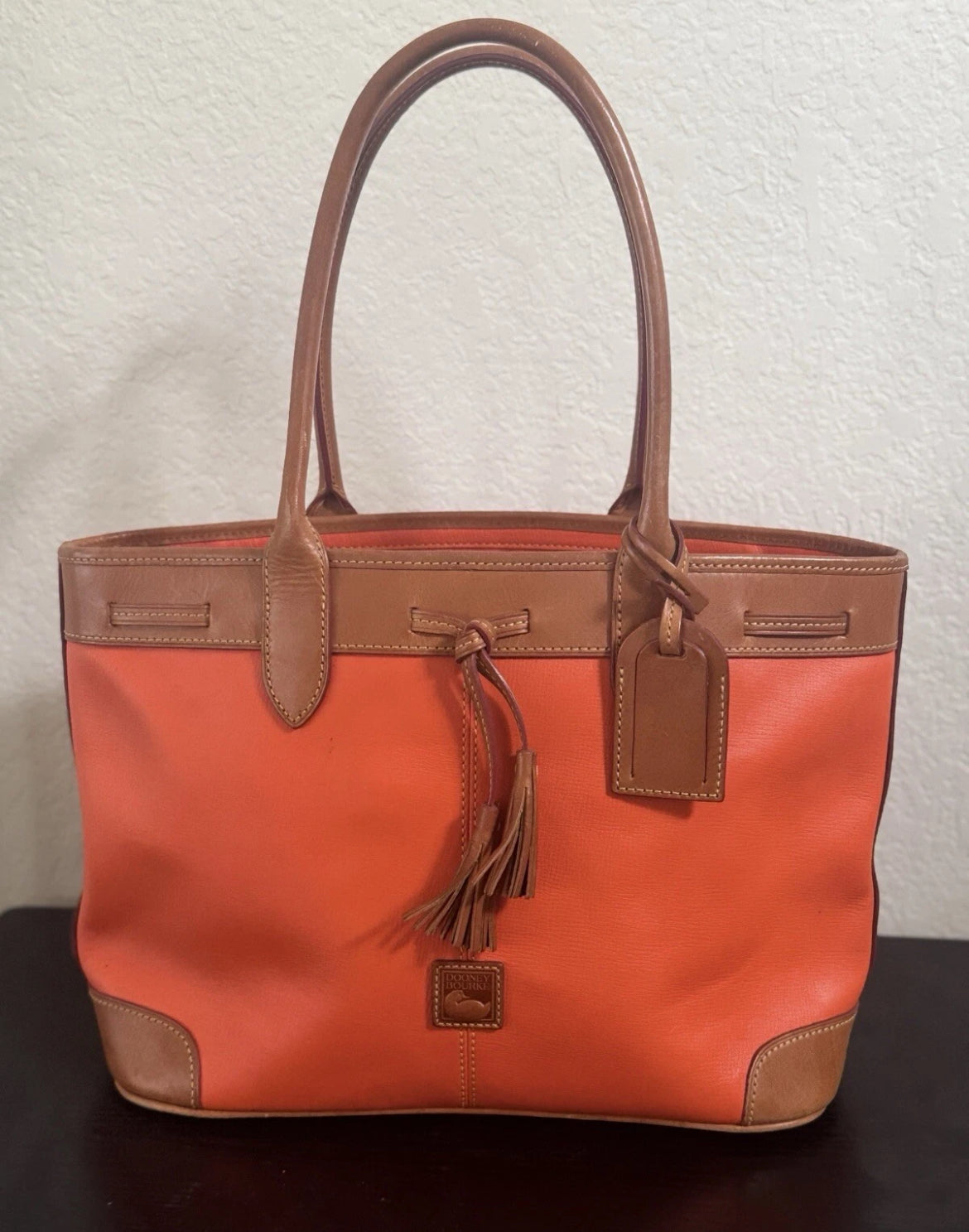 Preowned VINTAGE Dooney & Bourke Tote Bag Purse Saffiano Tassel Orange w/ Brown Trim