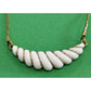 1981 Avon Gatsby Collection Gold Tone White Shell Swirl Drop Necklace 16"