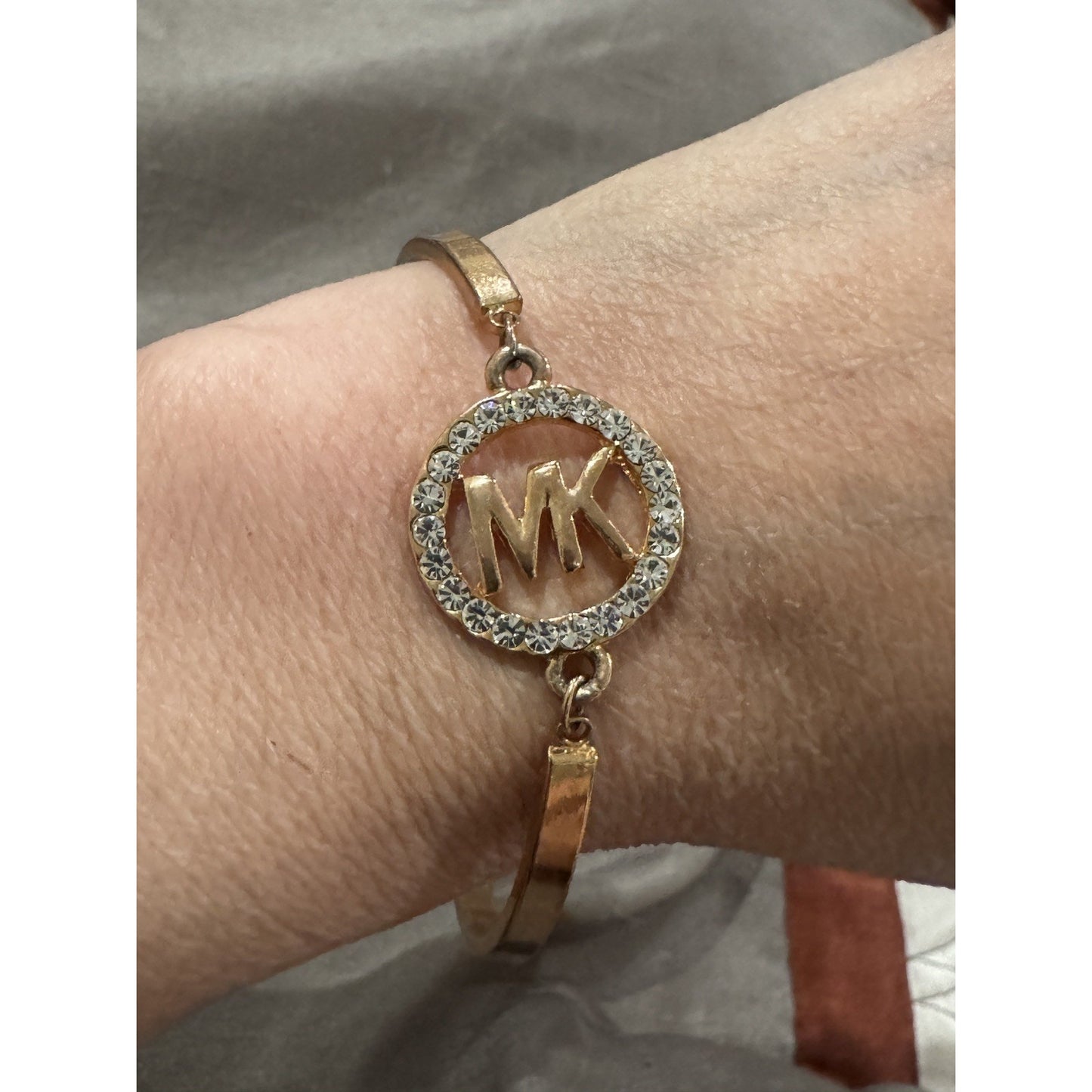 Michael Kors Rose Gold Pave Crystal MK Circle Hinged Adjustable Bracelet