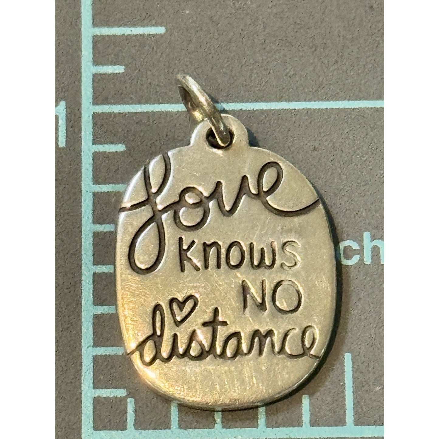 James Avery Retired Love knows no distance Sterling Silver