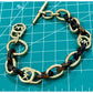 Michael Kors Tortoise Shell And Yellow Gold Tone MK Oval Link Charm Bracelet 8”