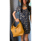 EUC Dooney & Bourke Caramel Pebble Grain Leather Large Logo Lock Slouch Sac