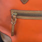 Preowned VINTAGE Dooney & Bourke Tote Bag Purse Saffiano Tassel Orange w/ Brown Trim