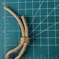Preowned Vintage New in Box Signed Christian Dior Gold Tone Textured Rope Knot Brooch Pin