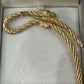 Preowned Vintage New in Box Signed Christian Dior Gold Tone Textured Rope Knot Brooch Pin