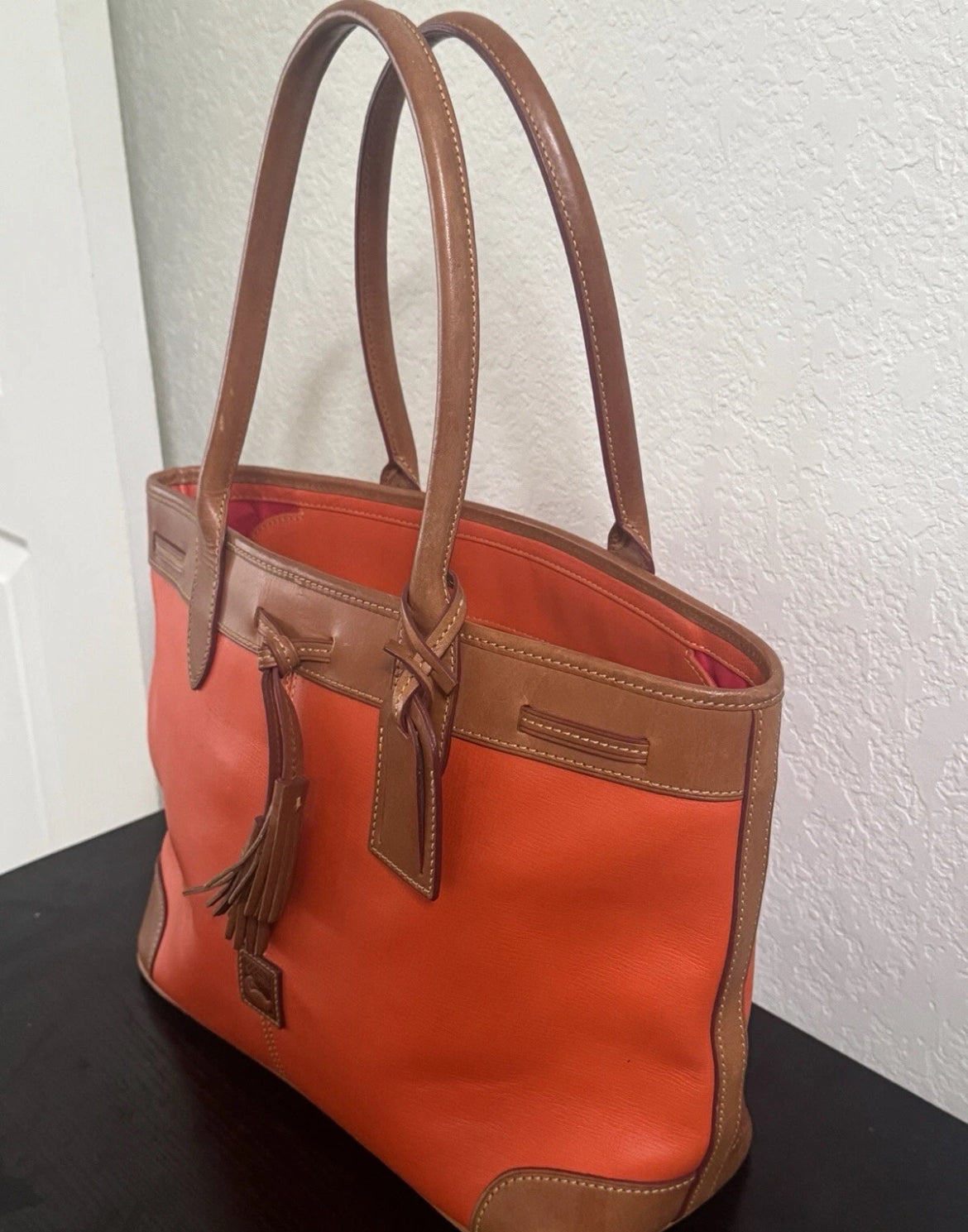 Preowned VINTAGE Dooney & Bourke Tote Bag Purse Saffiano Tassel Orange w/ Brown Trim