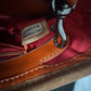 Preowned VINTAGE Dooney & Bourke Tote Bag Purse Saffiano Tassel Orange w/ Brown Trim