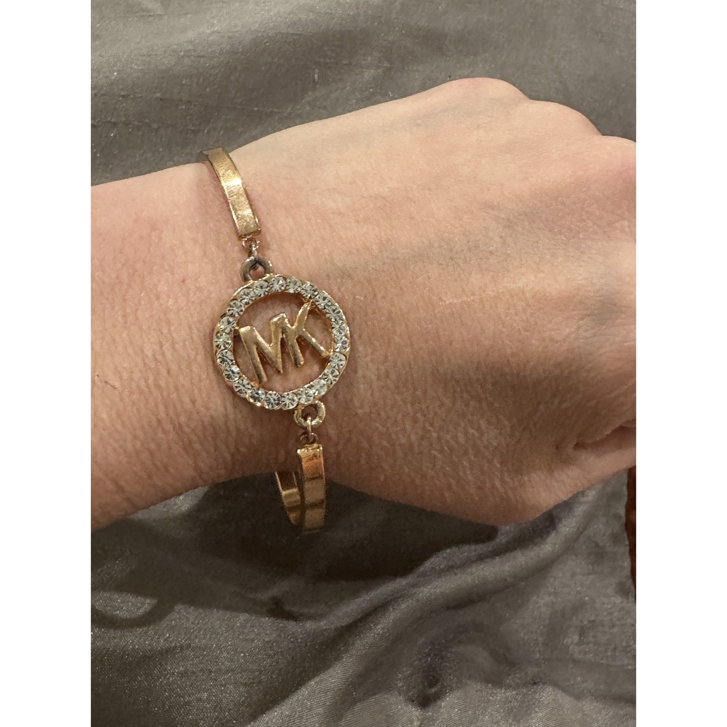 Michael Kors Rose Gold Pave Crystal MK Circle Hinged Adjustable Bracelet