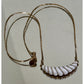 1981 Avon Gatsby Collection Gold Tone White Shell Swirl Drop Necklace 16"