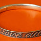 Pre-Owned Retired James Avery Sterling Silver Laugh Often Live Simply Love Deeply Bangle Bracelet