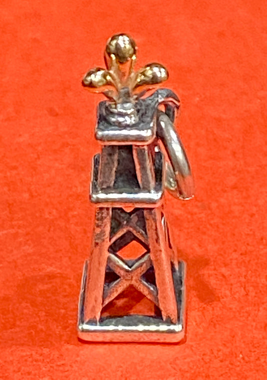 Pre-Owned James Avery Retired Silver and 14k Gold Oil Gusher Charm