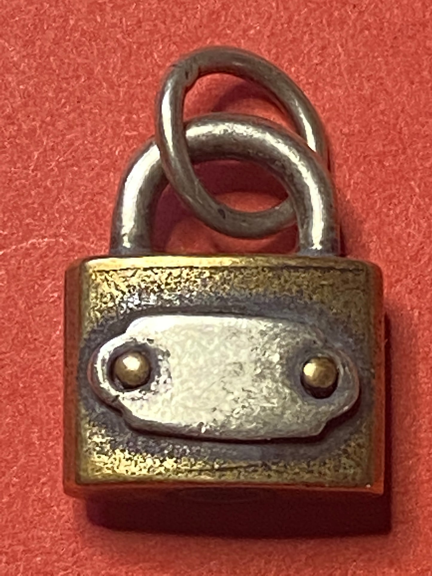 Pre-Owned James Avery Retired Silver and Bronze Bridge Lock Charm Uncut